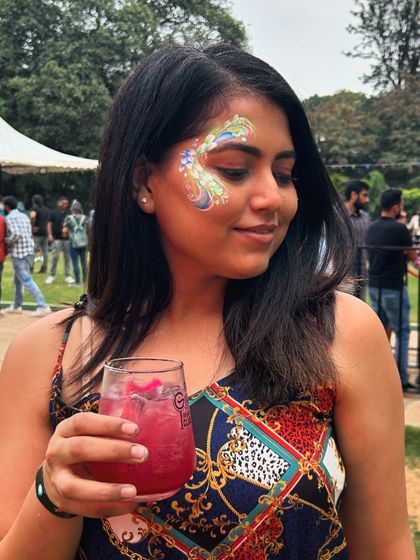 Whimsical Face & Body Art photo 5