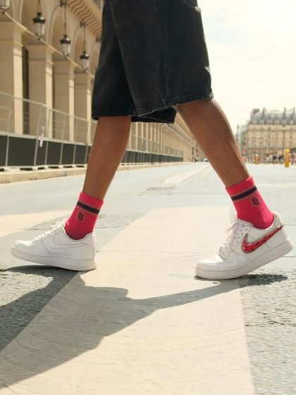 A close-up of the changeable swoosh sneakers in action on the streets of Paris.