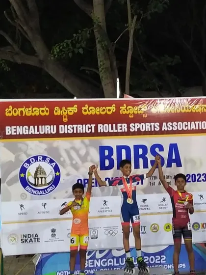 Samuel on the podium after winning a bronze medal at the Bangalore open district competition. A proud moment for him and the club.