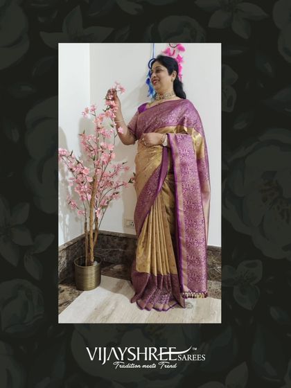 Our patron Ramadevi looking graceful in a gold and purple brocade Kanjivaram, a timeless piece from our collection.