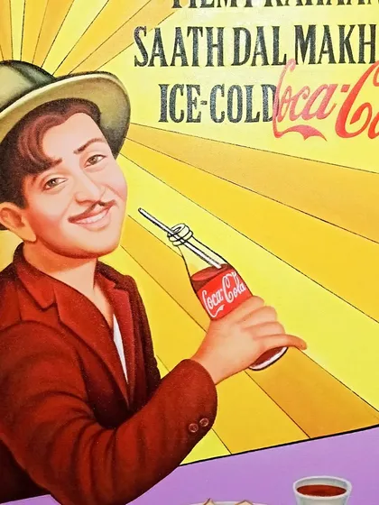 A close-up of the Raj Kapoor portrait from the Coca-Cola poster, showing the detail in his expression.