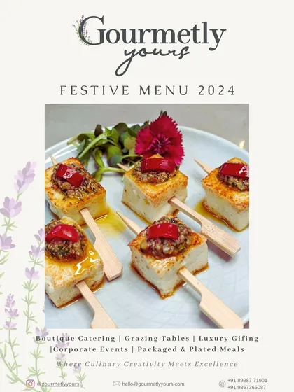 The cover of our Festive Menu 2024, featuring a beautifully plated appetizer. This graphic introduces our comprehensive offerings for the holiday season.
