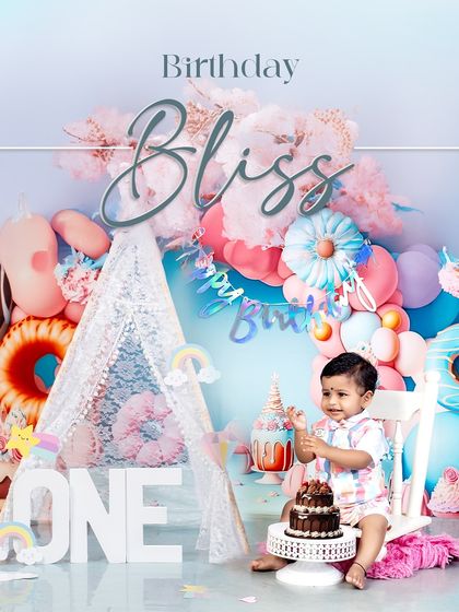 Birthday bliss is a perfectly decorated cake and a happy one-year-old. This little boy is ready to dig in, surrounded by a dreamy pastel setup.