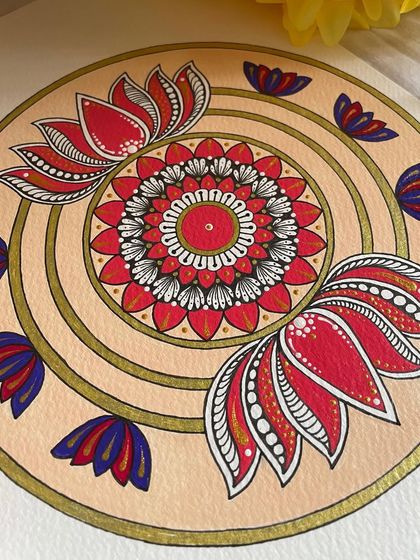 Let's do what we love and do a lot of it. This unique design plays with negative space, with lotus motifs blooming from the center.