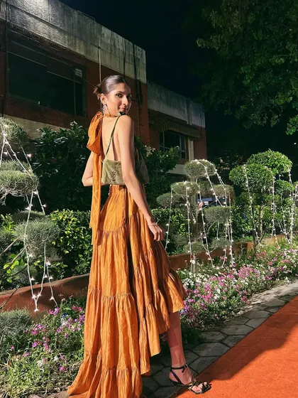 A view of the back of the dress, showing the dramatic bow detail. I love outfits with an element of surprise.