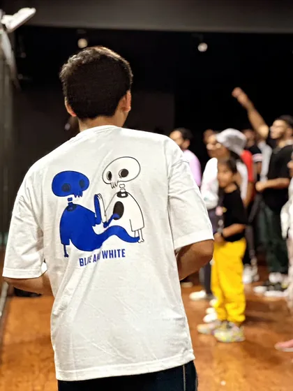 Another look at our community from the instructor's perspective. Seeing a room full of dancers ready to learn is one of the best feelings. The "Blue and White" shirt signifies our collective spirit.