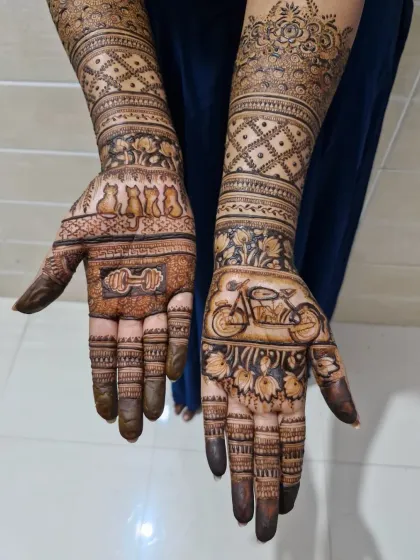 I love weaving personal details into my art. This custom bridal mehendi was designed for a bride who adores her four cats, her groom who is a fitness enthusiast, and her love for her Bullet motorcycle.