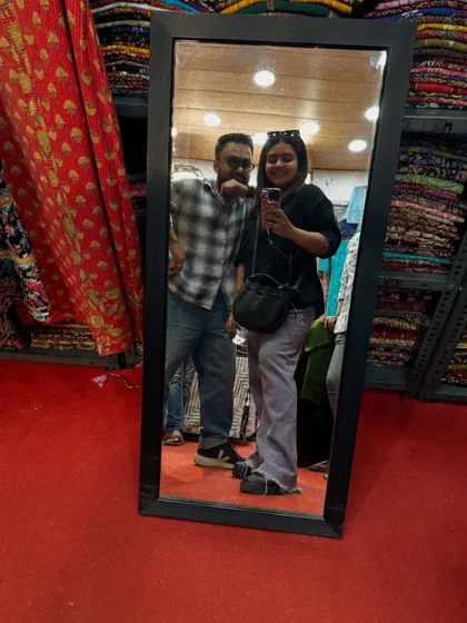 The hunt for the perfect fabric is a key part of my process. A quick mirror selfie during a sourcing trip with a client. It's these pani puri and fabric sourcing dates that build the best relationships.