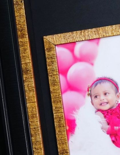 A close-up look at the beautiful detailing on one of our custom photo frames, perfect for displaying your cherished memories.