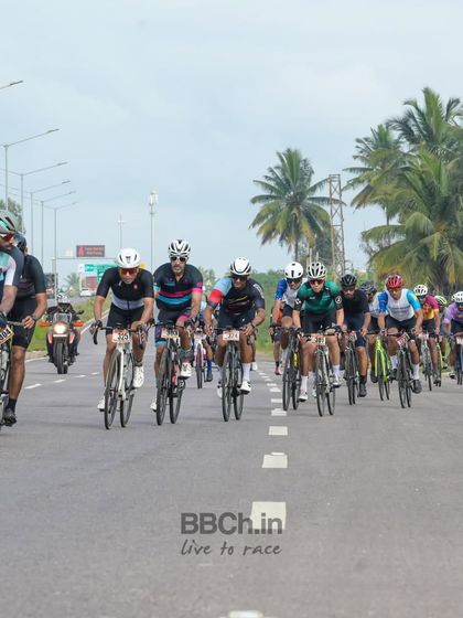 The peloton from an aerial perspective, showing the race from a unique and dynamic angle.