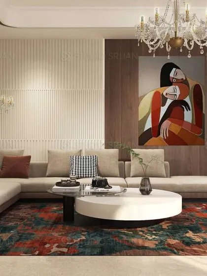 This living room is designed for both formal entertaining and casual family gatherings. I focused on creating a warm, inviting atmosphere with an L-shaped sofa, layered lighting from chandeliers, and a statement art piece that anchors the space.