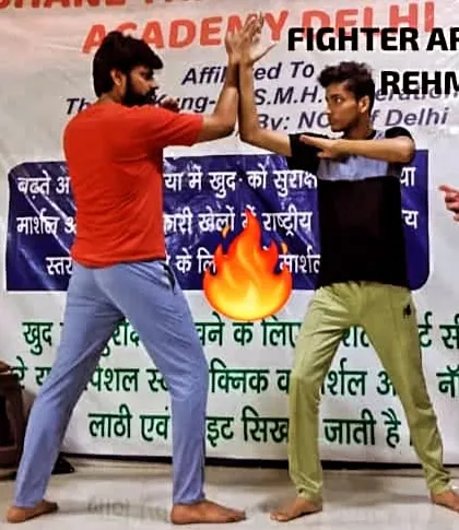 Two fighters, Arman and Rehman, locked in a partner drill. This is where you practice blocking and hand-trapping techniques, essential skills in close-quarters combat.