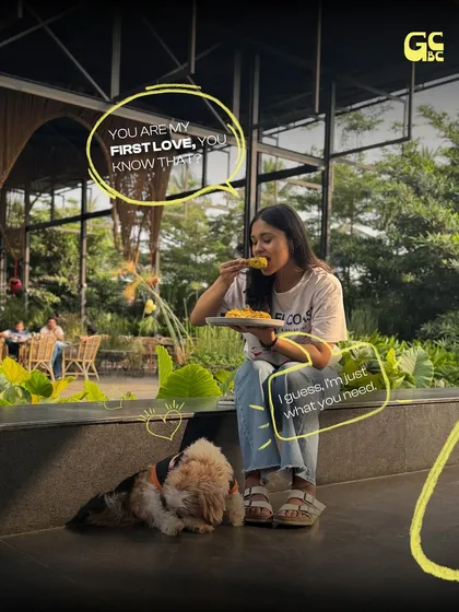 A conversation between best friends. I love seeing the bond between our guests and their pets. Here, it looks like the food is the main topic of conversation!