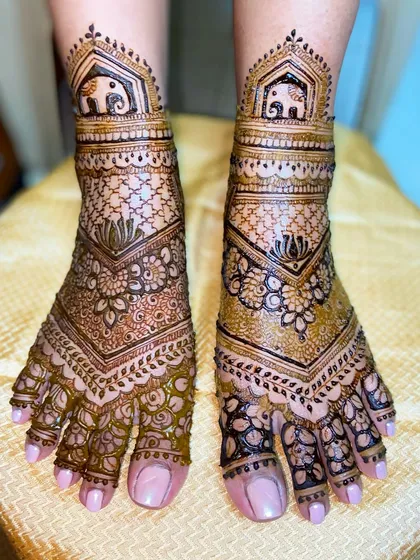 The same elegant elephant foot mehandi, showing the rich, dark stain of the natural henna.