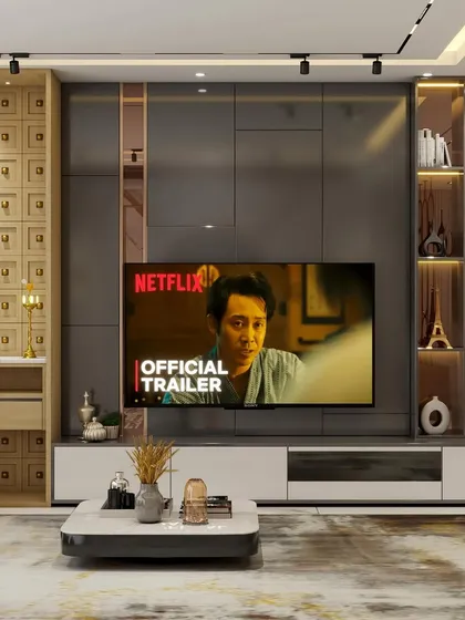 The entertainment unit from the 3D design, showcasing a large TV, integrated storage, and display niches. The dark paneling creates a cinematic feel, making it the perfect spot for movie nights.