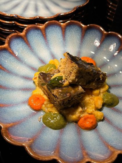 The vibrant colours and careful composition of this dish are a testament to our belief that presentation is key.