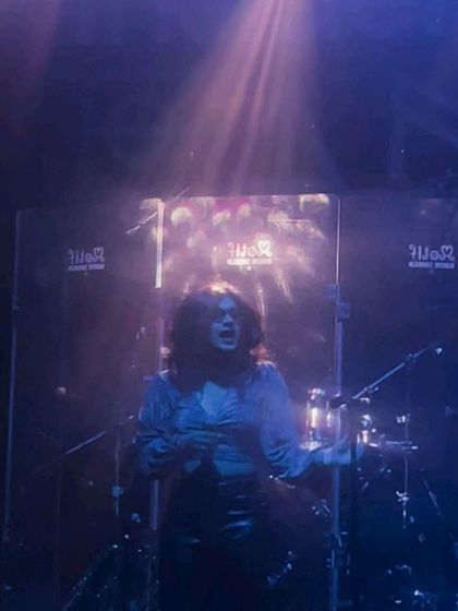 A surreal moment opening for one of my idols, Motherjane. This photo, with the spotlight shining down, captures the dreamlike feeling of that night.