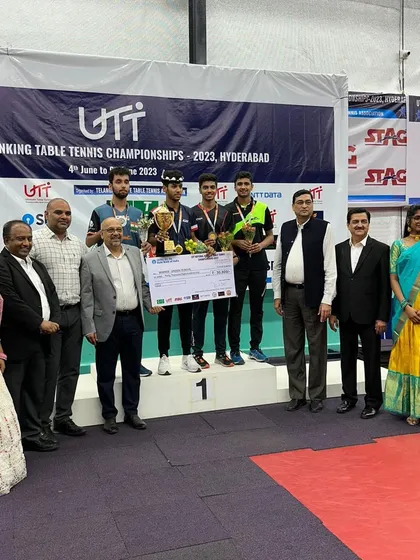 A wide shot of the podium and dignitaries at the UTT National Ranking Championships in Hyderabad.
