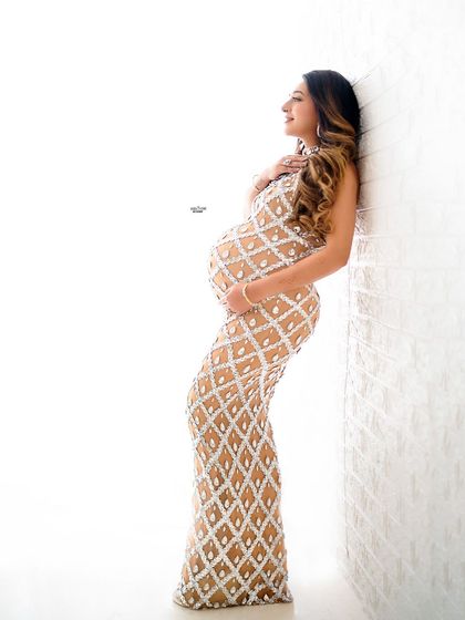 This profile shot against a white brick wall adds texture to a high-key setup. You'll learn to use your studio environment to add variety to your shots.