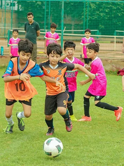 The competitive fire starts early. Here, our U8 players are locked in a battle for the ball during the Pride Cup, showcasing the passion and fundamental skills we build from the grassroots level.