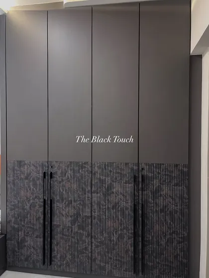 A 360-degree view of a recently completed site in Ghatkopar East. This image shows a modern wardrobe with a unique textured laminate on the lower half.