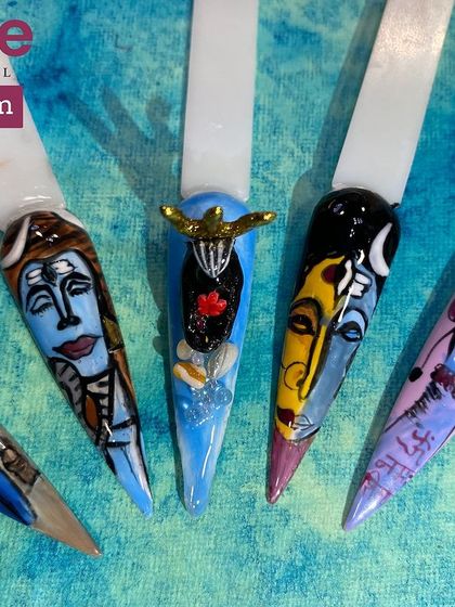 This image highlights the 3D elements and vibrant colors used in the Shivratri nail art.