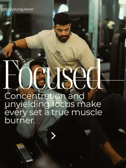 I focus on making every set count. Here, I'm guiding a client through a leg isolation exercise, ensuring they maintain concentration and form to maximize muscle activation and prevent injury.