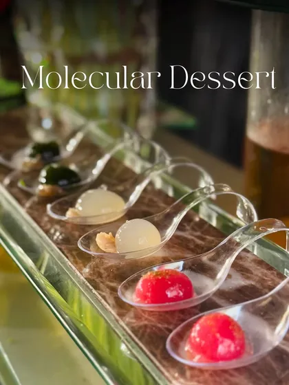 An annotated image of my molecular dessert spheres, showcasing the variety of flavours available. These innovative bites are a fun and futuristic addition to any dessert menu.