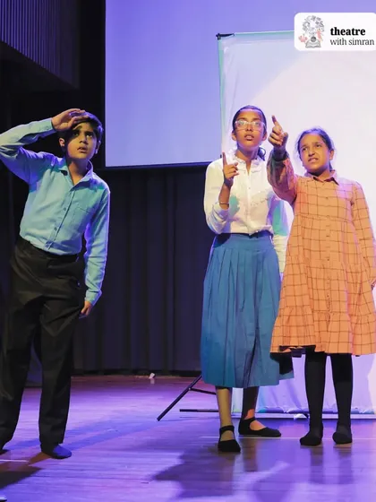 The Pevensie children look on in wonder as they discover the world of Narnia in our stage production.
