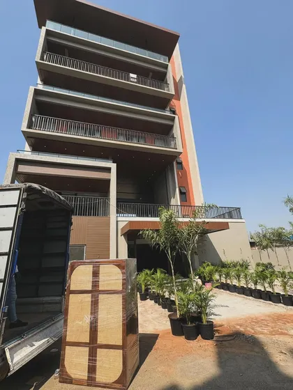 A custom wardrobe being delivered to a modern apartment building, showcasing my delivery and installation service.