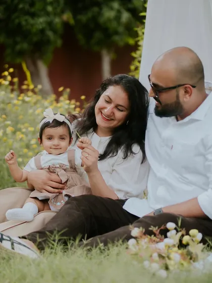 The whole family together in a beautiful garden setting. These relaxed, outdoor family portraits are filled with warmth and genuine connection.