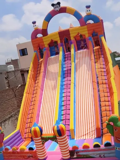 A very tall multi-slide bouncy, designed for maximum thrill. This is a great centerpiece for a fair or large amusement area.