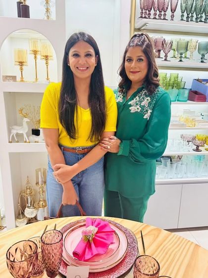 Posing with a participant at our Nestasia workshop. We are standing by the beautiful pink and gold tablescape we created, showcasing how to mix colors and textures.