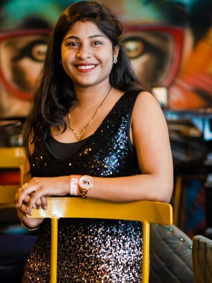 A guest posing at the bar.