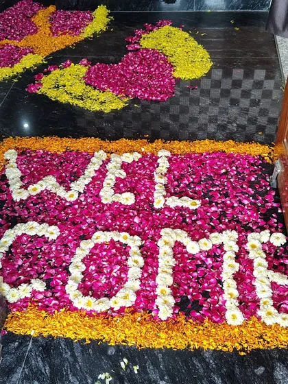 It's the details that make an event special. I create custom welcome messages at the entrance using fresh flower petals, which adds a unique and elegant touch for guests as they arrive.
