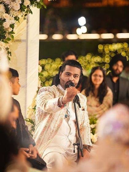 My outfits are chosen by performers and celebrities too. Here, a musical artist wears one of my sherwanis while performing at a high-profile wedding event.