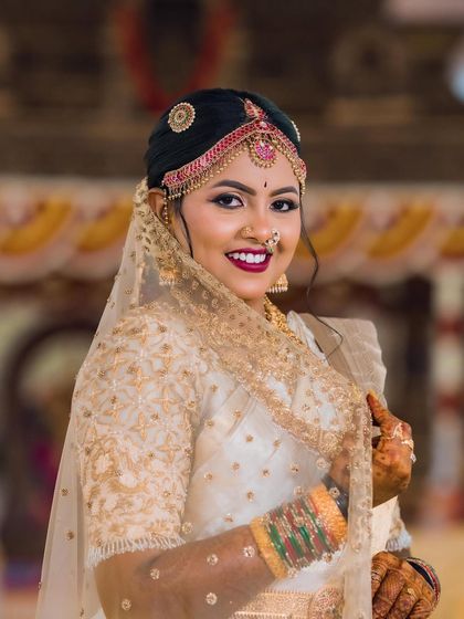One of my favorite photos from my wedding album, showcasing the complete look with the veil.