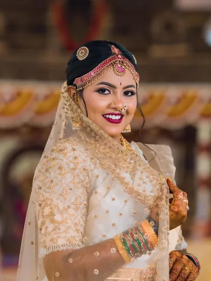 One of my favorite photos from my wedding album, showcasing the complete look with the veil.