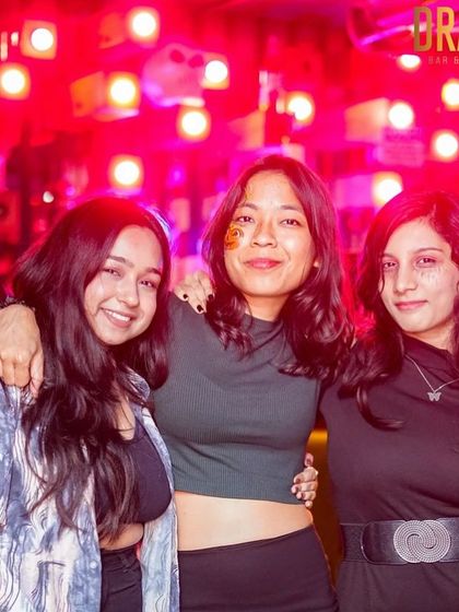 A group of friends enjoying the themed night at Drava.