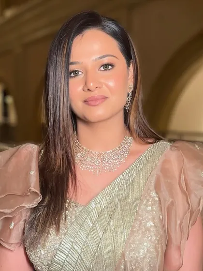 A close-up of the golden glam look. The dewy base and muted lips keep it classy and fresh, while the rhinestones add a playful twinkle.
