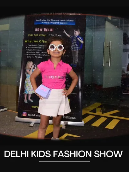 This little fashionista is ready for her close-up with her stylish sunglasses and pose. Auditions are the perfect place to practice for the big day.