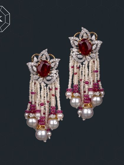 These earrings crafted from rubies, diamonds, and pearls are the most stunning combination for an ethereal elegance.