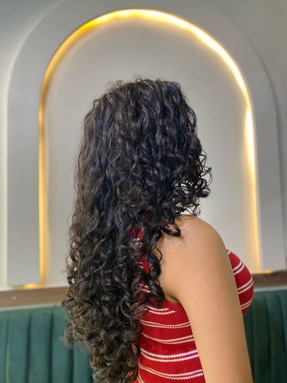 A gallery of my wonderful clients flaunting their unique and beautiful curls. Every curl pattern is different, and I love celebrating them all.
