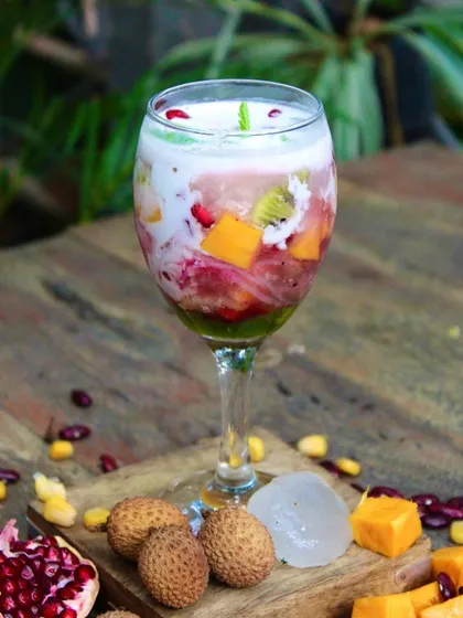 A closer look at our vibrant Ice Kachang, with layers of fruit, beans, and creamy coconut mylk. It's your new summer bestie in a glass.