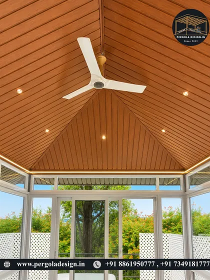 The interior of this glass room is designed for comfort and style. The vaulted wood-finish ceiling, panoramic windows, and integrated lighting create a spacious and airy environment that feels both luxurious and welcoming.