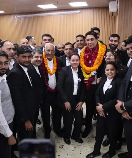 A group photo with my team and supporters. This picture captures the collective spirit and unity that I want to foster within the Rohini Court Bar Association.
