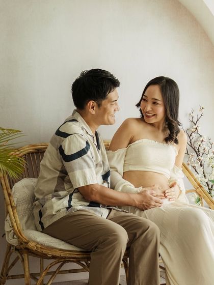A candid moment of laughter and love between this beautiful Japanese couple during their maternity session at my studio.