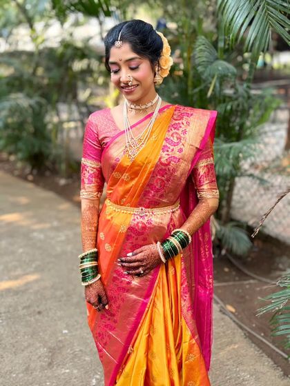 A serene and graceful shot of the bride. The makeup is soft and natural, allowing her inner beauty to shine through.