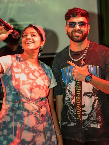 Sharing the stage with a talented rapper. I love the energy of live music and enjoy promoting emerging artists in the city's vibrant music scene.