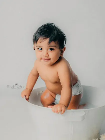 Trying to make a great escape. These candid moments show off your baby's playful personality.